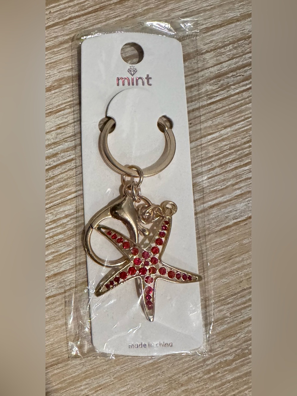 Starfish Gold-Tone Keychain with Red Sparkling Accents